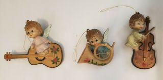 3 Vintage 1950’s Plastic Angel Christmas Ornaments.  Guitar,  French Horn,  Cello