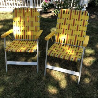 2 Vintage Folding Aluminum Lawn Chairs With Webbing In Orange/yellow/burnt Orang