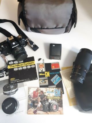Vintage 1979 Nikon Em With 50mm Lens,  2 Extra Lens,  Camera Bag,  Manuels Broken
