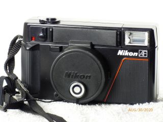 Nikon L35 Af 35mm F2.  8 Vintage Camera To Near
