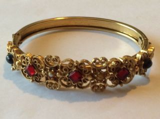 Vintage Estate Gold Tone Side Hinged Bangle Bracelet With Red And Black Stones