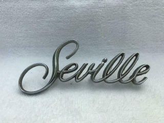 Vintage Cadillac Seville Fender Script Emblem Oem 1608846