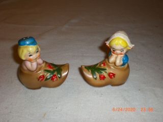 Vintage Lefton Dutch Boy And Girl Sitting In A Shoe Salt And Pepper Shakers