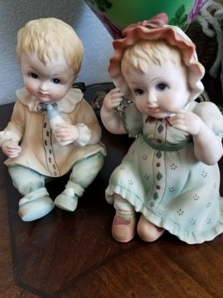Vintage 2 Porcelain Bisque Seated Boy Girl Piano Baby Figurines Lefton Sh