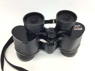 Vintage,  Nikon Action 7x35,  8.  6 Degree Binoculars w/case.  good cond ' n 3