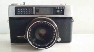 Vintage Taron Vic 35mm Camera With 1:2.  8 45mm Lens.