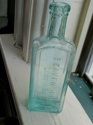 Vintage Aqua Glass Embossed Bottle Beaver And Oil Compound