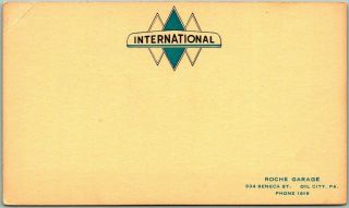 Vintage Oil City,  Pa Business Postcard Roche Garage W/ International Trucks Logo