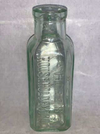 Vintage Hire’s Household Extract Clear Small Glass Bottle