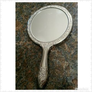 Vintage Hand Held Vanity Mirror Metal Silver Repousse Flowers 9 1/2 " Long Heavy