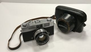 Vintage Konica Auto S1.  6 Fixed Lens Rangefinder 35mm Film Camera W/ Leather Case