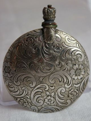 Vintage metal perfume bottle with floral pattern 2