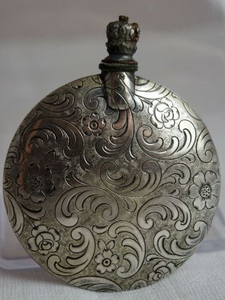 Vintage metal perfume bottle with floral pattern 3