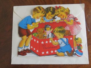 Vintage Christmas Card Norcross Children Toys Dye Cut Cute 1950