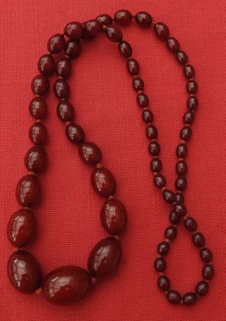 Vintage Long Graduated Cherry Amber Knotted Bakelite Beads 77gms Tests Bakelite