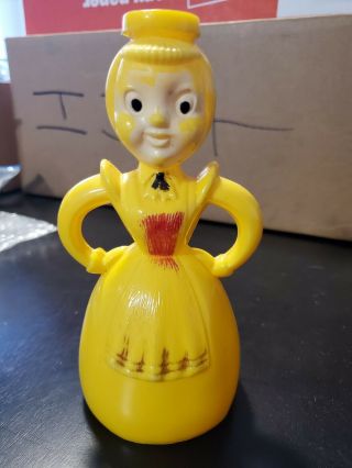 Vintage Yellow Merry Maid Laundry Sprinkler
