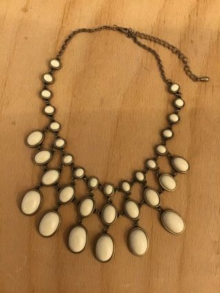 T1 Vintage Bib Necklace With 3 Layers Of Ivory Cabochon Beads Set In Dark Tone.