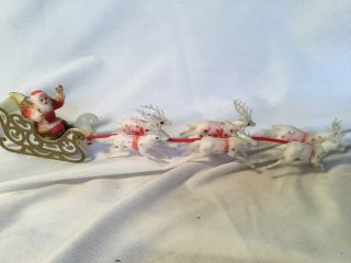 Vintage Santa And Reindeer Plastic.  Sleigh And 6 Deer.  Red And White.  10 Inch