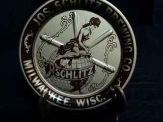 vintage collectible metal Jos.  Schlitz beer girl on world/ globe ashtray 2