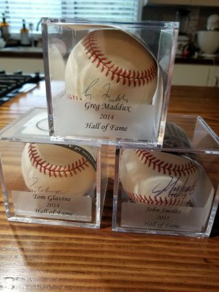 Tom Glavin John Smoltz And Greg Maddux Autographed Baseballs