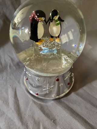 Vintage Penguins Looking At Dinner Snow Globe - Plays Joy To The World