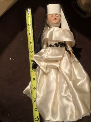 Vintage 10.  5” Catholic Nun Doll With Crucifix And Sleepy Eyes.