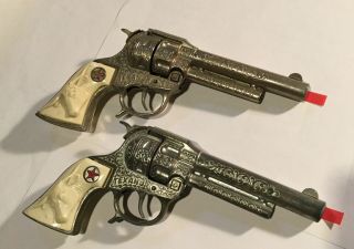 2 Vintage Hubley Texan Jr Red Star Die - Cast Toy Cap Guns