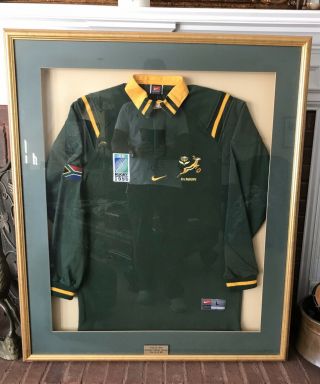 Team Autographed Nike South Africa 1999 Springboks Rugby Jersey 21/80 Framed