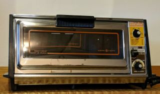 Vintage Ge Toaster Oven - General Electric,  Model A8 T26,  1500 W,  Chrome / Wood