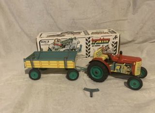 Vintage Schylling wind up metal tractor trailer.  Czech made 2