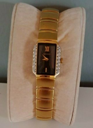 Vintage Seiko Ladies Gold Tone Bracelet Watch With Clear Crystals And Black Face
