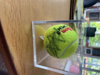 Andre Agassi Hand Signed Tennis Ball.  In Protective Case.