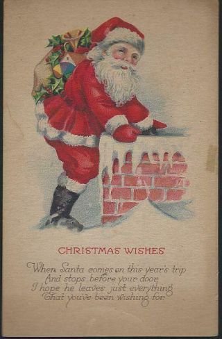 Vintage Christmas Wishes Postcard With Santa Claus On Roof Going Down Chimney
