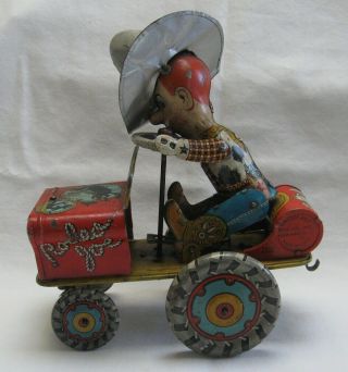 Vintage Unique Art Rodeo Joe Tin Wind Up Crazy Car Toy