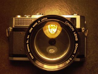 Canon 7 Rangefinder Camera W/ 50mm F:0.  95 Lens,  1/2 Case Bottom & Nikon 72n Cap