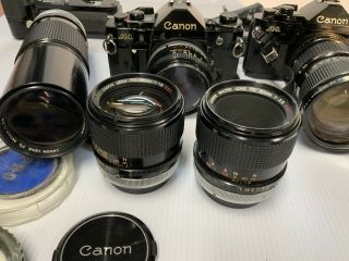 2 - Canon A - 1 Cameras 35mm With Extra Professional Lens,  Flash,  Motor Drive