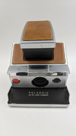 Vintage Polaroid SX - 70 with flash,  case and docs.  and.  B&W film inc 2