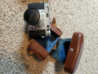 Voigtlander 35mm Prominent Camera With Nokton 1:1.  5/50 Lens & Case