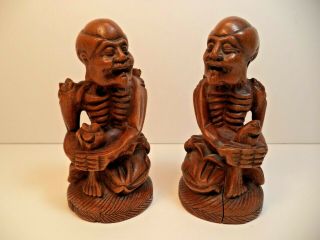 2 Vintage Hand Carved Wood Man Statue Carving Look Mens Skull Little Man Skelets