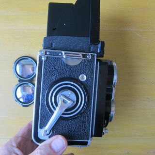 Rolleiflex 2.  8E film camera with Zeiss 80mm f2.  8 Planar Lens,  Serial No.  1640449 3