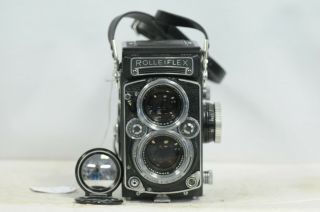 Rolleiflex 2.  8e - Iii Xenotar With Mirror Cap & Strap