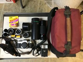 Canon Ae - 1 Camera,  4 Lenses,  Misc.  In Bag