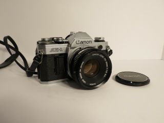 Canon Ae - 1 35mm Slr Film Camera W/ Canon Fd 1:1.  8 50mm Lens And Lens Cap