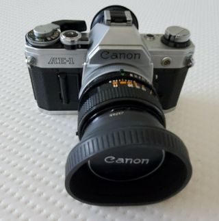 Canon AE - 1 35mm SLR Film Camera Bundle with Multiple Lenses and More 2