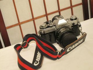 Canon Ae - 1 Slr 35mm Film Camera W Canon Fd 50mm 1.  8 Lens & Strap