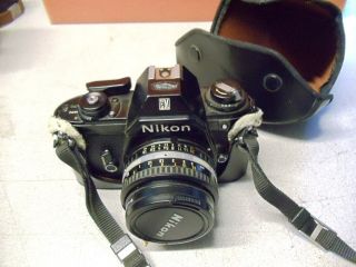 Nikon Em 35mm Camera W/vivitar Uv Filter,  Strap & Coat