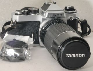 Nikon Fe Camera & Sigma Zoom 75 - 210mm F3.  5 - 4.  5 Ais Lens,  W/ Strap & Batteries