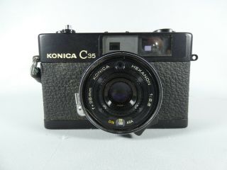Vintage Konica C35 35mm Compact Film Camera Hexanon 1:2.  8 F=38mm Lens Strap C 35