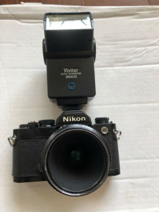 Vintage Nikon 35mm Fm W 55mm Lens And Vivitar Flash