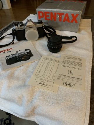 Pentax K1000 Camera W/ 50mm Lens,  Instructions,  And Box.  Look